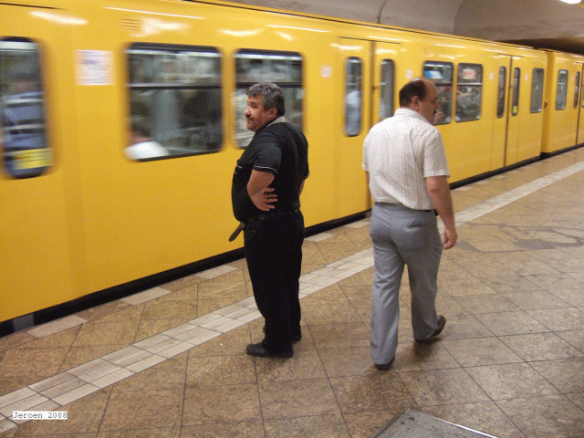 two men underground metro u-bahn berlin